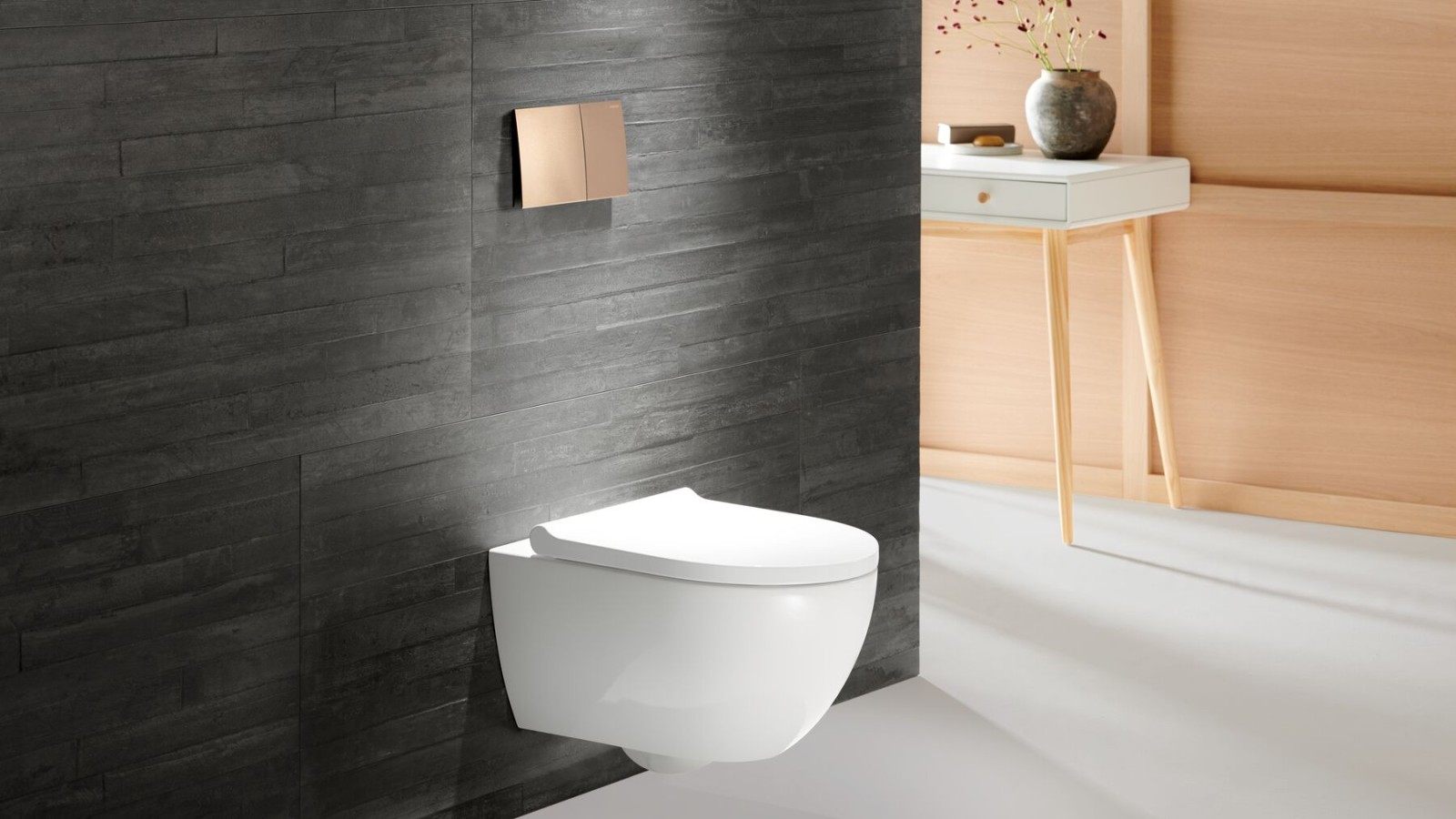Geberit Acanto WC mit Geberit Betätigungsplatte Sigma70 in Rosegold Geberit Acanto WC mit Geberit Betätigungsplatte Sigma70 in Rosegold