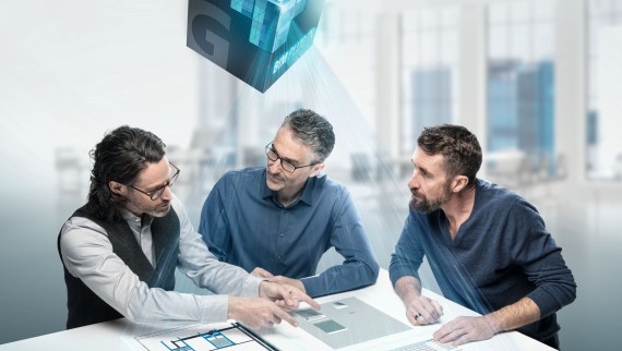 Planer diskutieren an einem Tisch mit BIM Symbol Planer diskutieren an einem Tisch mit BIM Symbol